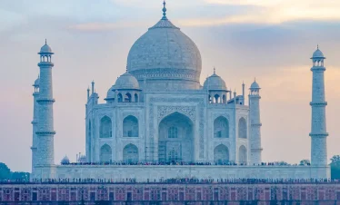 Taj Mahal sunrise view in Agra India with reflection pool
